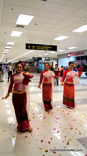 Thai AirAsia FD4111 inaugural flight - Dancers welcome passengers at Chiangmai Airport
