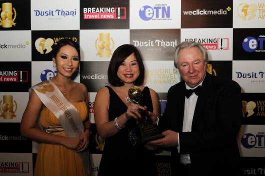 Karen Tan, Regional Director of Revenue and Marketing, Swissotel The Stamford with Graham Cooke, President and Founder, World Travel Awards