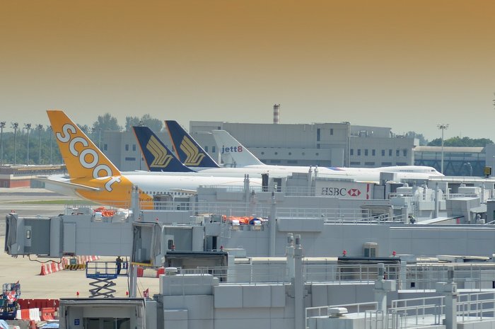 SCOOT & Singapore Airlines (SQ) aircraft at Changi Airport