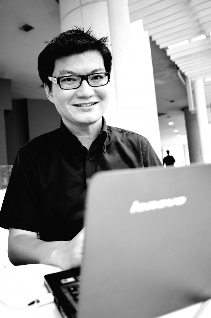Profile: Adrian Eugene Seet using Laptop