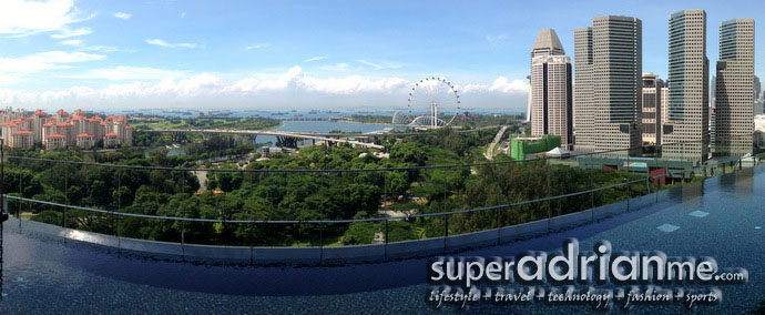 Pan Pacific Serviced Suites Beach Road with panoramic view of Singapore skyline by the infinity pool
