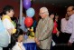 President Tony Tan speaks to a young girl who participated in The Ultimate Telematch at Nanyang Polytechnic