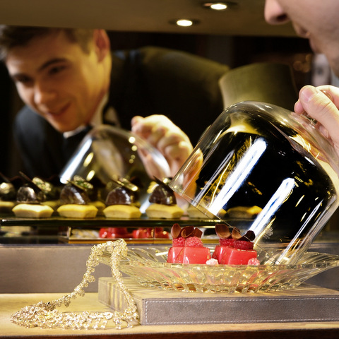 Butler ready to serve afternoon treats from the luxury trunk