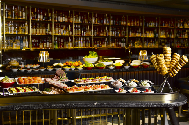 Mini-bagel station with a creative repertoire of toppings and housemade cream cheese smears