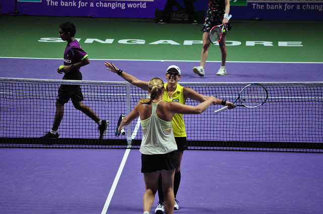 Rodionova/Kudryavtseva embrace after upsetting 4th seeds Vesnina/Makarova (Photo by Sean Long)