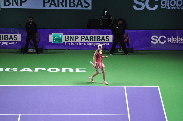 Caroline Wozniacki reacts after winning the tight first set