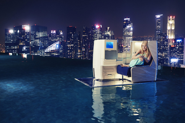 Gwyneth Paltrow reclines in a British Airways Club World seat atop Marina Bay Sands SkyPark, Singapore