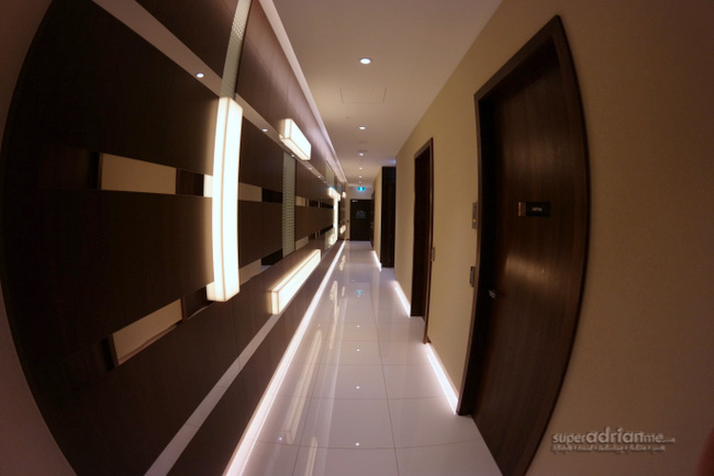 Corridor next to the dining area leading to the children's playroom, prayer rooms and restrooms.