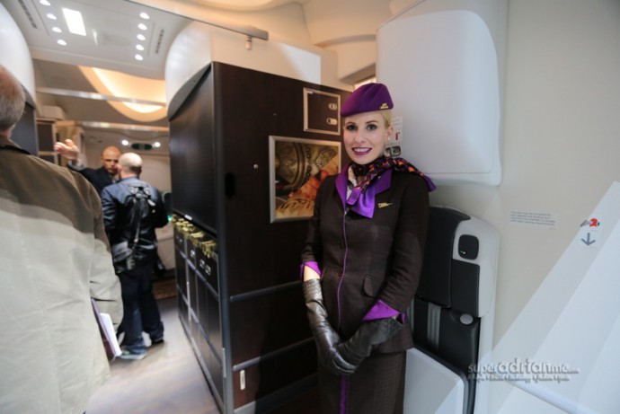 Cabin crew welcoming guests onboard Etihad Airways new B787-9 Dreamliner