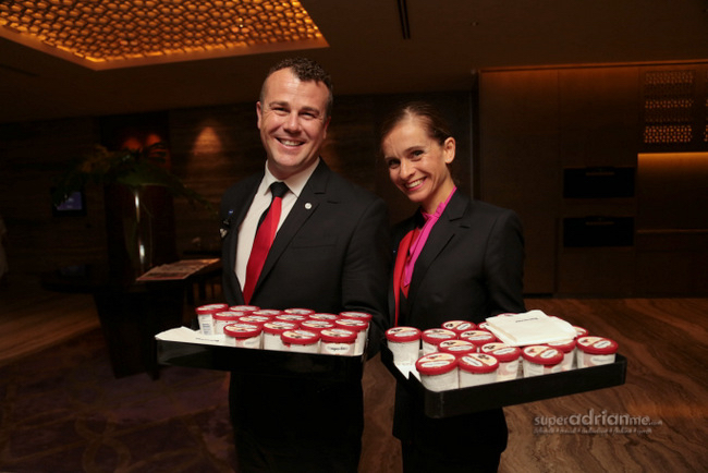 QANTAS Cabin Crew serving Haagen-Dazs ice cream.