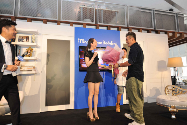 Christopher Lee surprises Fann Wong at Marie France Bodyline press event
