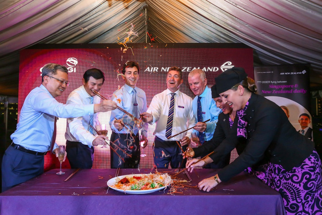 Air New Zealand executives and guests join in the Chinese New Year festivities with the Prosperity Toss or ‘Lo Hei’, for success and good fortune.