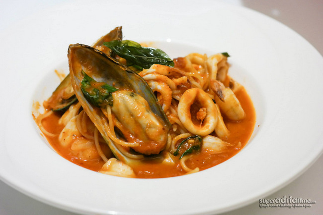 Dazzling Cafe Singapore - Spicy Tom Yam Tomato Spaghetti at S$22.90.