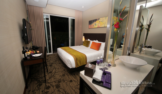 Quay Rooms on level two offer direct pool access at Park Regis Singapore