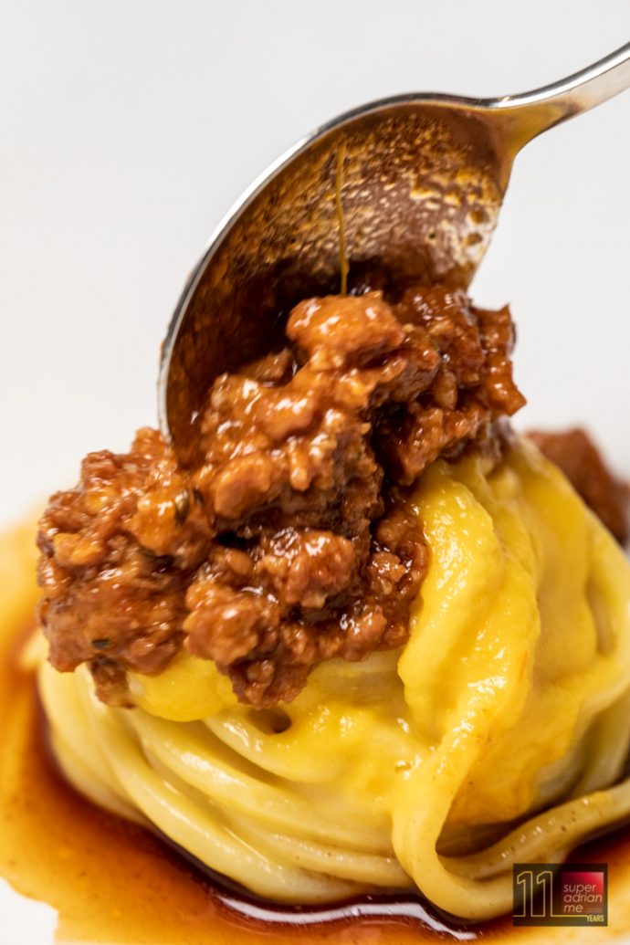 Dolce Vita - Spaghetti Chitarra - Wild pork luganega ragout with yellow datterino coulis, roasting thyme jus 